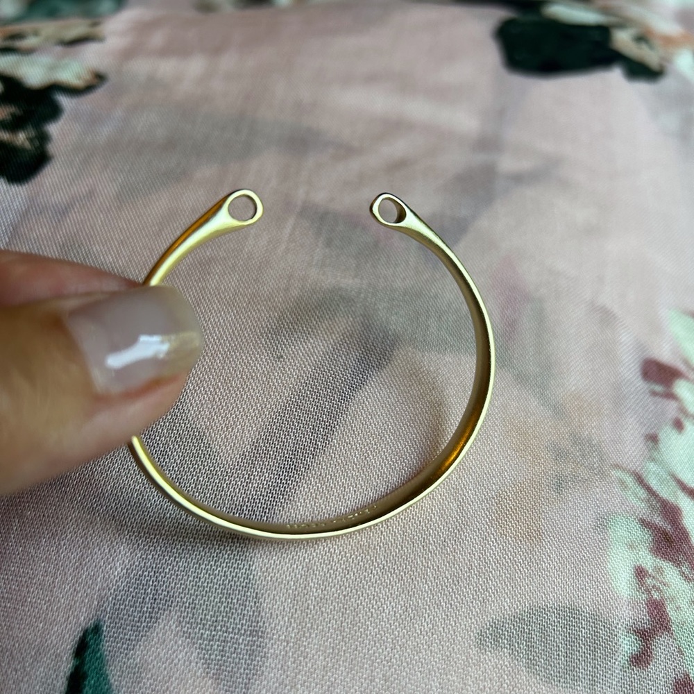 Kendra Scott gold charm bracelet. Never worn